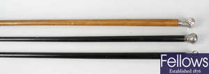 A selection of four Victorian and later walking sticks.