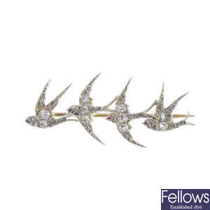A late Victorian silver and gold diamond swallow brooch, circa 1880.
