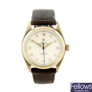 ROLEX - a gentleman's 9ct yellow gold Oyster Perpetual wrist watch.