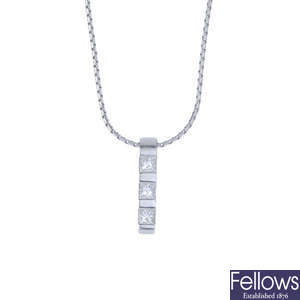 An 18ct diamond pendant, with chain.