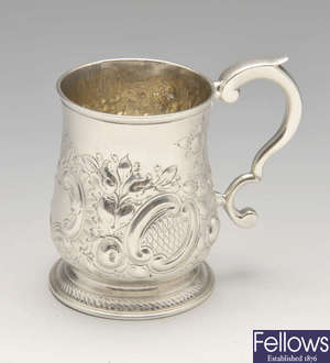 A George II silver mug.