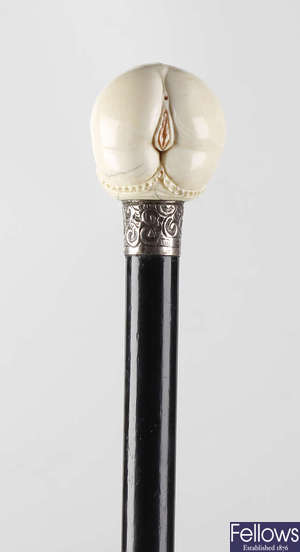 A 1920's silver and ivory mounted walking stick.