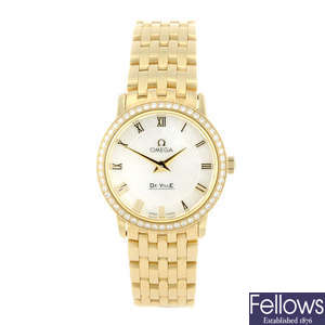 OMEGA - a lady's 18ct yellow gold De Ville bracelet watch.