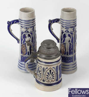 A group of pottery steins. 