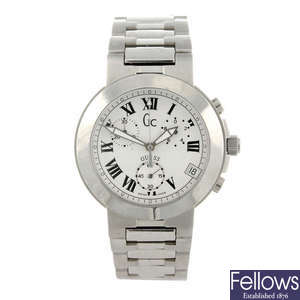 GUESS - a gentleman's stainless steel GC13500 chronograph bracelet watch with two other Guess watches.