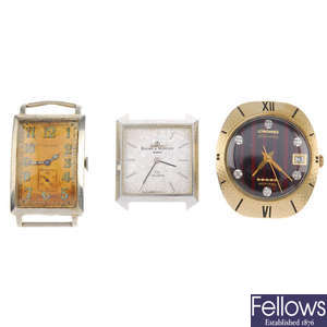 LONGINES - a gentleman's white metal watch head with two other watch heads.