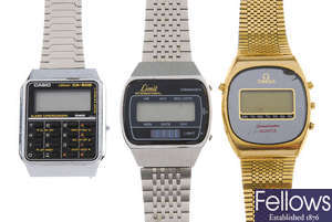A group of six digital watches.