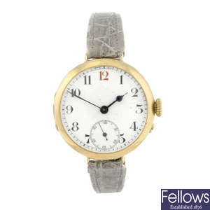 A gentleman's 9ct yellow gold trench style wrist watch.