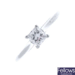 A platinum diamond singe-stone ring.