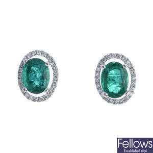 A pair of 18ct gold emerald and diamond earrings.