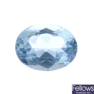 An oval-shape aquamarine, weighing 5.76cts.