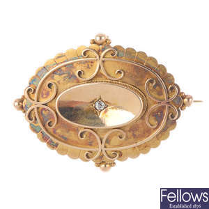 A late Victorian 15ct gold and diamond memorial brooch and a paste double clip.