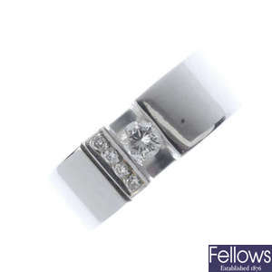 A 14ct gold diamond band ring.