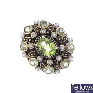 A peridot and split pearl cluster ring.