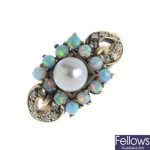 A 9ct gold split pearl, opal and diamond ring.
