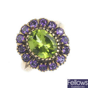 A 9ct gold peridot and amethyst cluster ring.