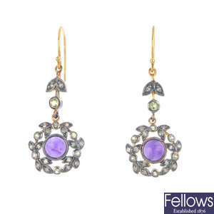 A pair of amethyst, gem and diamond earrings.