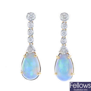 A pair of 18ct gold opal and diamond earrings.