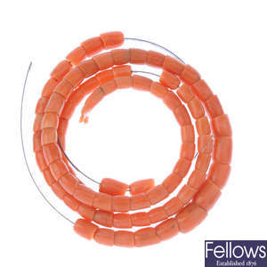 Two wired lengths of coral beads.