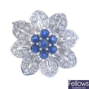 A 14ct gold sapphire and diamond floral cluster ring.