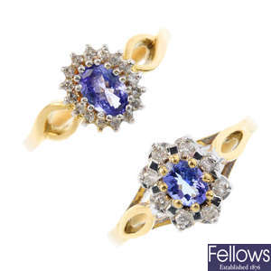 Two 18ct gold tanzanite and diamond cluster rings.