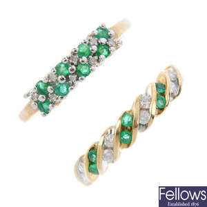 Four 9ct gold emerald and diamond rings.