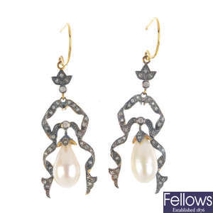 A pair of freshwater cultured pearl and diamond earrings.