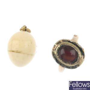 An bone pendant and a ring.