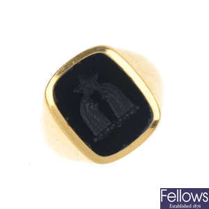 A mid 20th century 18ct gold onyx signet ring.