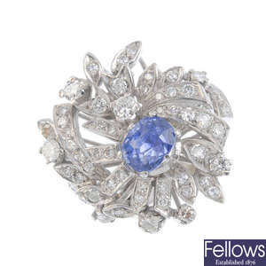A mid 20th century sapphire and diamond floral dress ring.