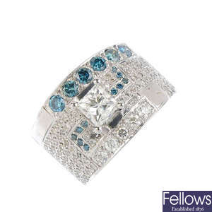 A diamond and colour treated 'blue' diamond ring.