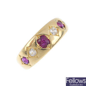 An 18ct gold ruby and diamond ring and a 9ct gold citrine pendant.