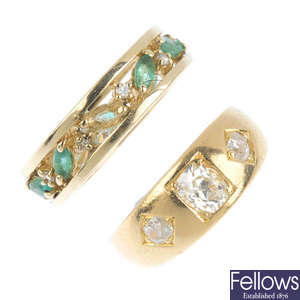 An early 20th century 18ct gold diamond ring and a 9ct gold emerald and diamond ring.