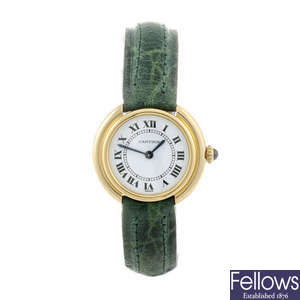 CARTIER - a yellow metal Ellipse wrist watch