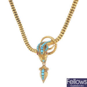 A mid Victorian gold, turquoise and garnet snake necklace.