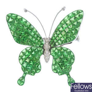 A tsavorite garnet and diamond butterfly brooch.
