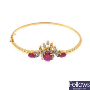 A glass-filled ruby and diamond hinged bangle and ring.