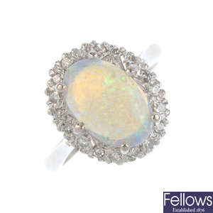 An opal and diamond cluster ring.