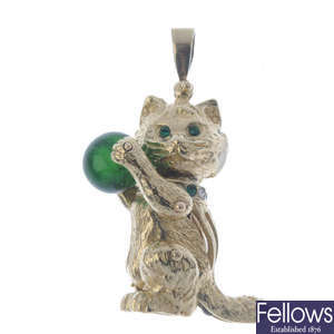 A 1970s 9ct gold paste novelty kitten pendant.