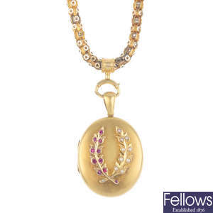 A late 19th century gold ruby and split pearl locket.