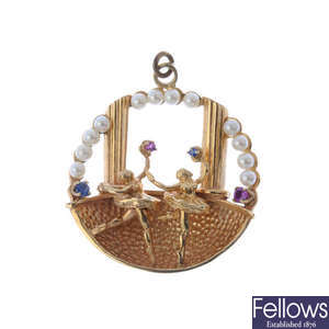 A sapphire, ruby and cultured pearl ballet dancer pendant.