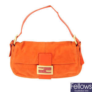 FENDI - an orange suede baguette handbag.