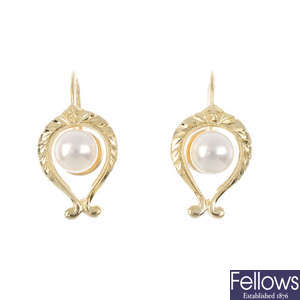 MIKIMOTO - a pair of cultured pearl earrings.