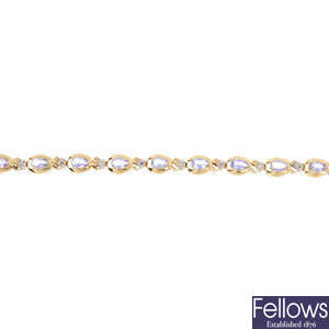 A 14ct gold diamond and tanzanite bracelet.