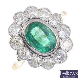 A diamond and emerald cluster ring.