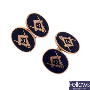 A pair of 9ct gold and enamel Masonic cufflinks.