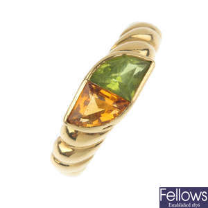 An 18ct gold citrine and peridot dress ring.