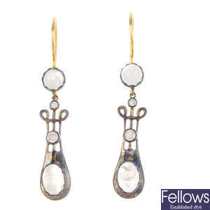 A pair of moonstone and diamond earrings.