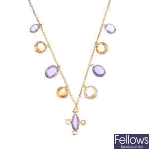 A citrine and amethyst necklace.