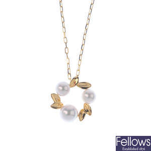 MIKIMOTO - a cultured pearl pendant, with chain.